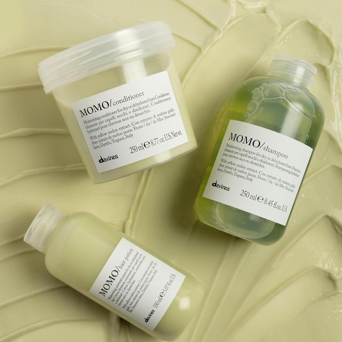 Davines MOMO shampoo being poured to create lather for gentle cleansing