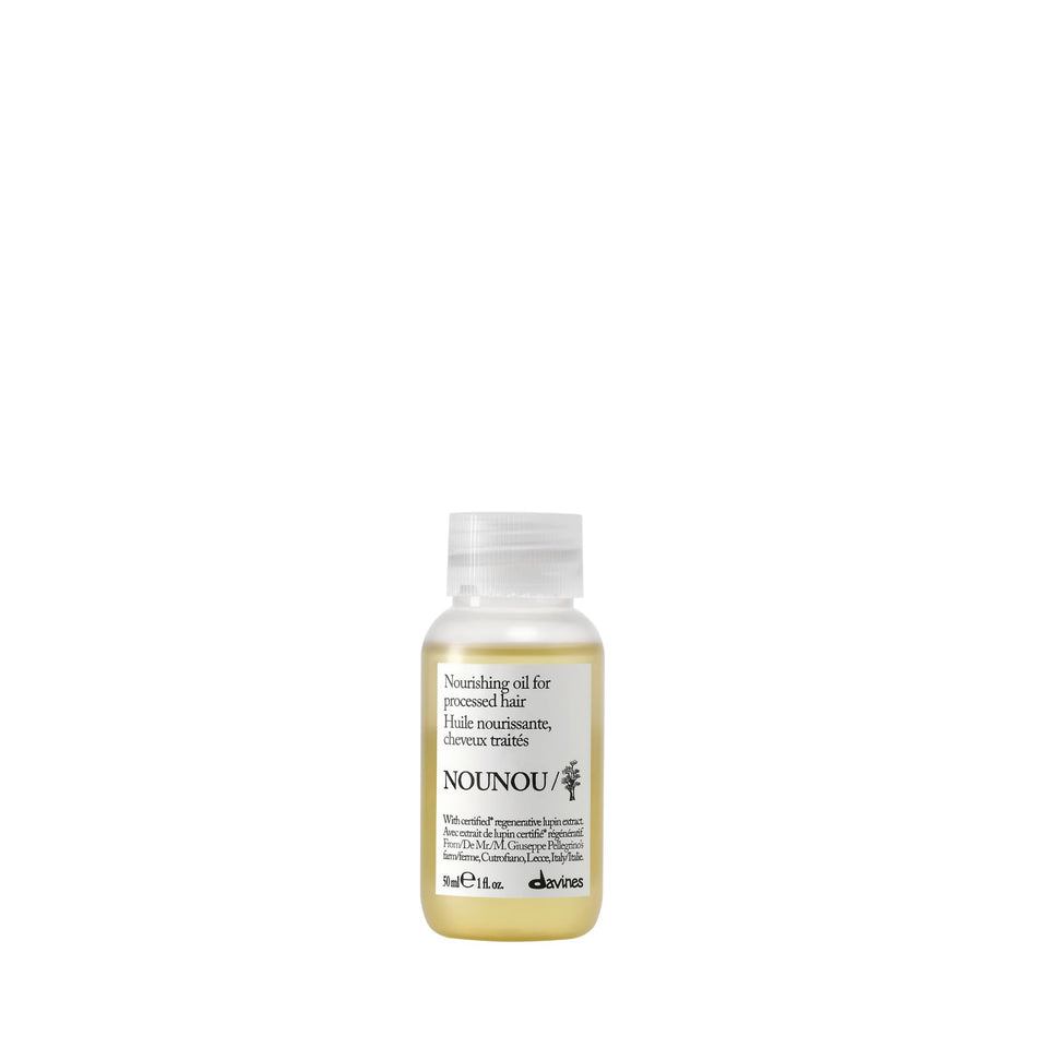 Davines bottle front packaging showing product and benefit of repair