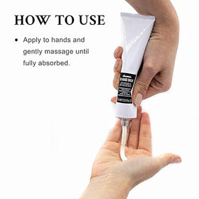 Hand applying Davines OI showing fast absorption and non-greasy finish