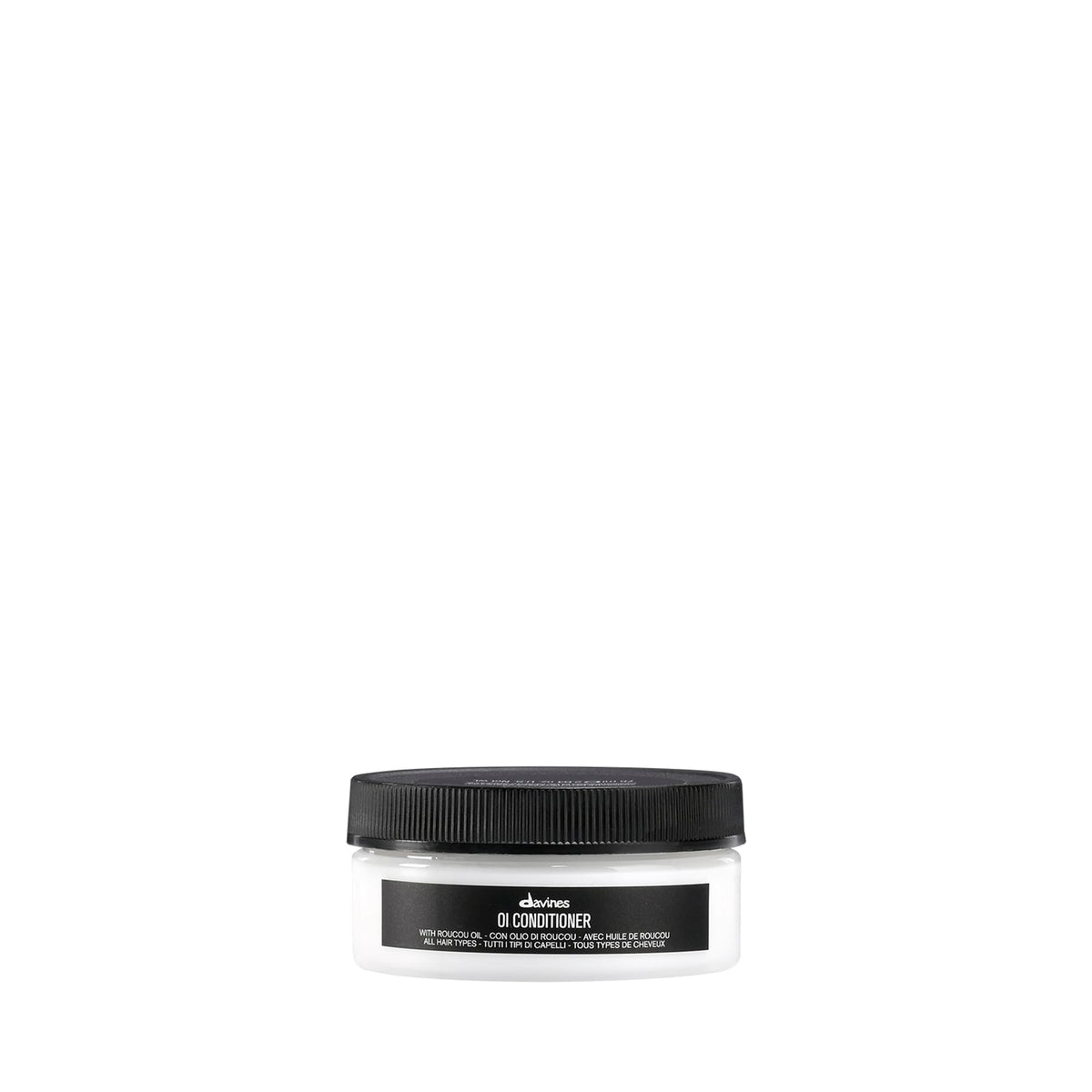 Davines OI Conditioner front packaging shows compact travel bottle and brand benefit