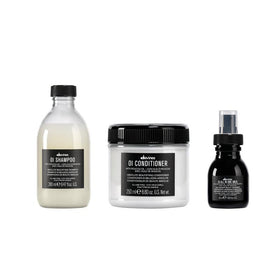 Davines OI gift set front packaging showing full-size bottles and travel milk, elegant presentation