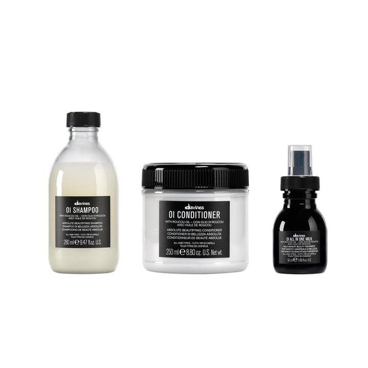 Davines OI gift set front packaging showing full-size bottles and travel milk, elegant presentation