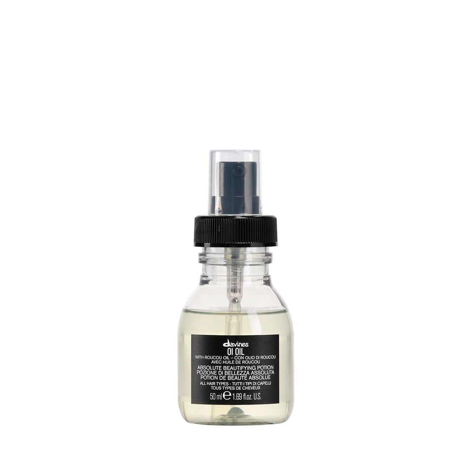 Davines front bottle showing compact travel-size and lightweight shine benefits