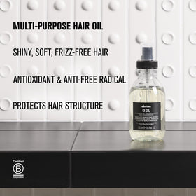 Davines OI Oil applied to wet hair, aiding detangling and faster drying