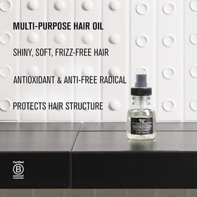 Davines travel size beside passport emphasizing portability and on-the-go styling