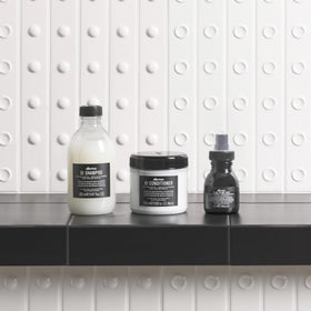 Davines OI products lined up side view highlighting routine order and cohesive design