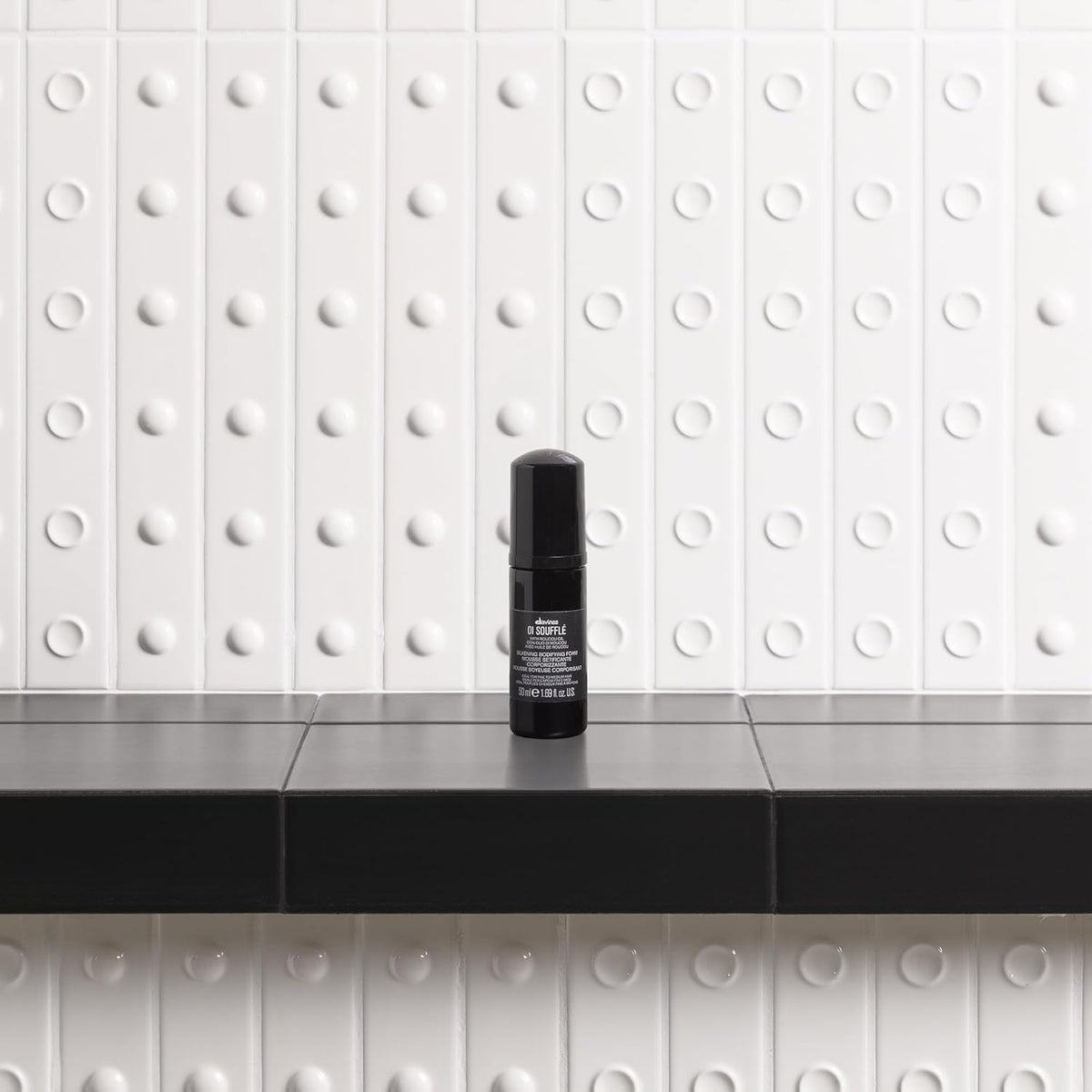Davines OI Soufflé turning from liquid to foam demonstrating even distribution benefit