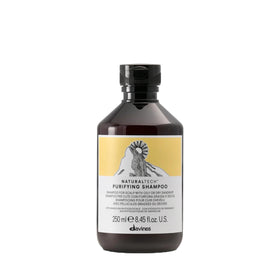 Davines bottle front view showing product and brand, clarifying benefits
