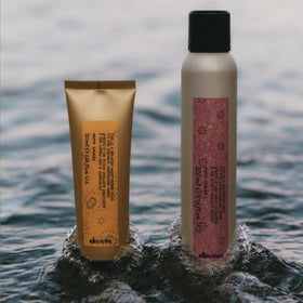 Davines used while blow-drying to help tools glide and speed up styling time