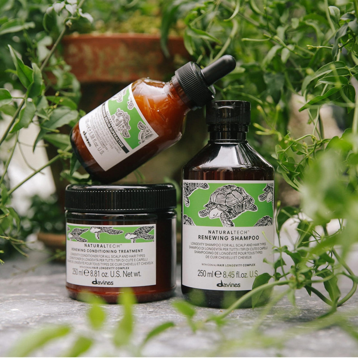 Davines renewing shampoo in shower illustrating in-use cleansing benefit