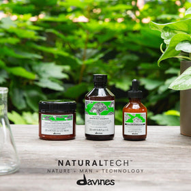 Davines renewing shampoo pump close-up highlighting easy dispensing and control