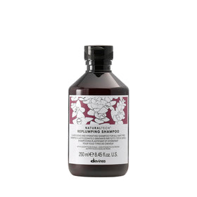Davines bottle front view showing replumping shampoo for fuller hair benefits