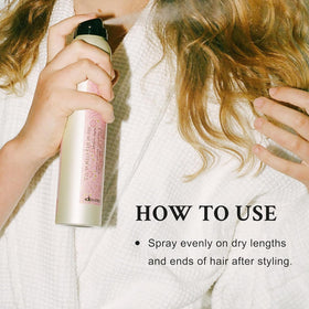 Davines mist being sprayed on hair to reduce frizz and boost shine