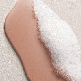 Davines SOLU in-shower use with foam rinsing to refresh scalp and strands