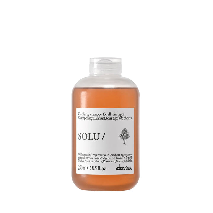 Davines SOLU/ shampoo front bottle showing clean packaging and product identity