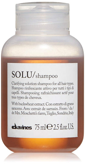 Davines SOLU front bottle showing travel-size and clarifying benefit