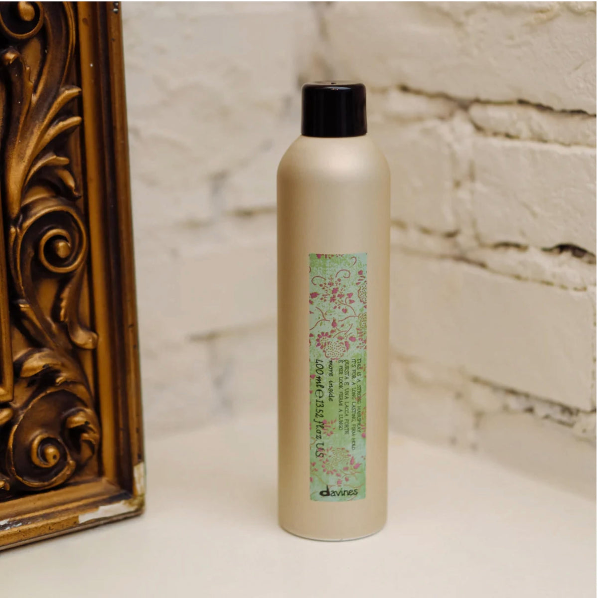 Davines strong hairspray back label with ingredient and use information