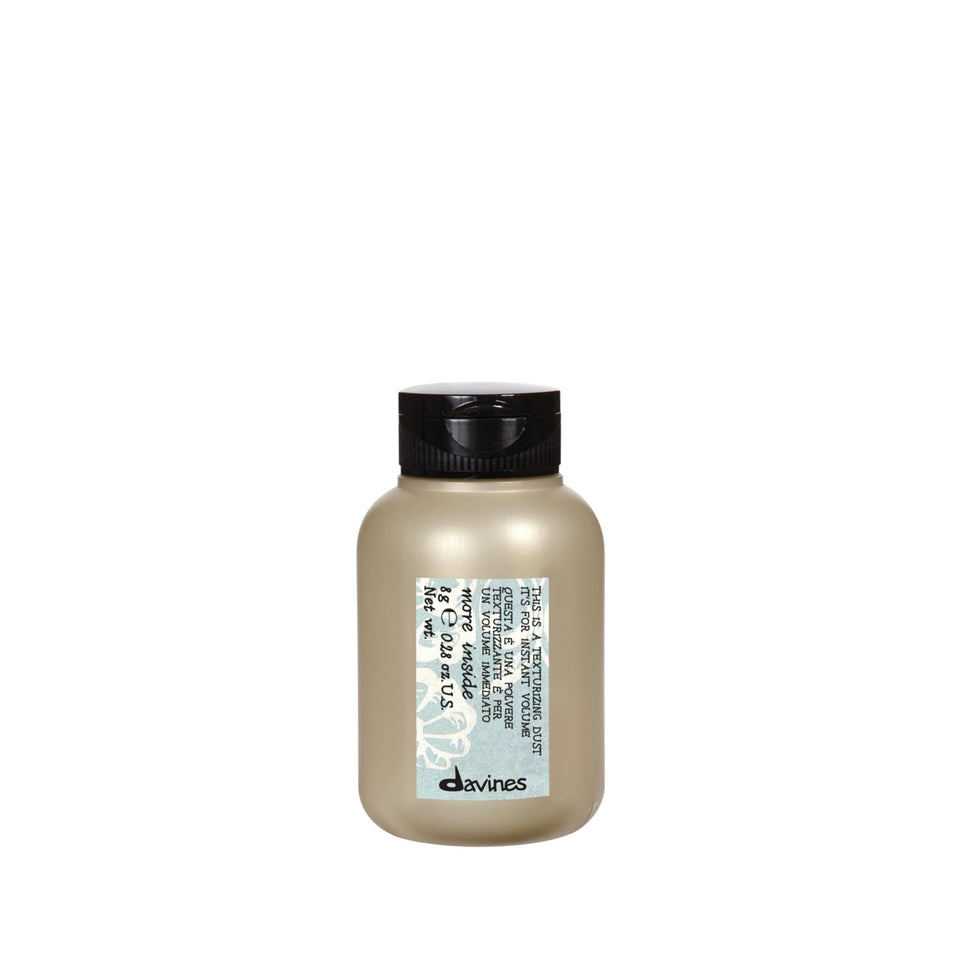 Davines product front packaging showing compact volume powder and branding benefit