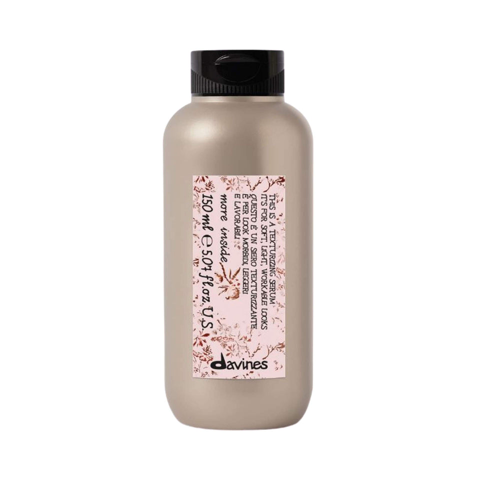 Davines bottle front view showing label and elegant design, highlights brand quality