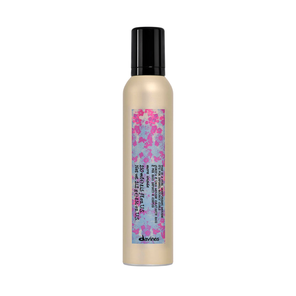 Davines front packaging showing product and benefit of defined curls