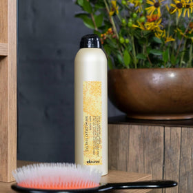 Davines ultra-fine mist action delivering even coverage and fast drying
