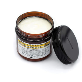 Davines applying conditioner to damp hair mid-lengths and ends for manageability