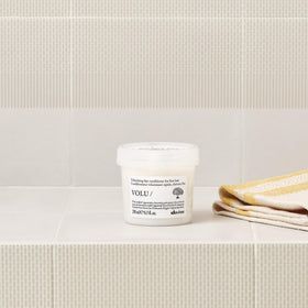 Davines VOLU/ clementine extract close-up emphasizing natural-derived volume support