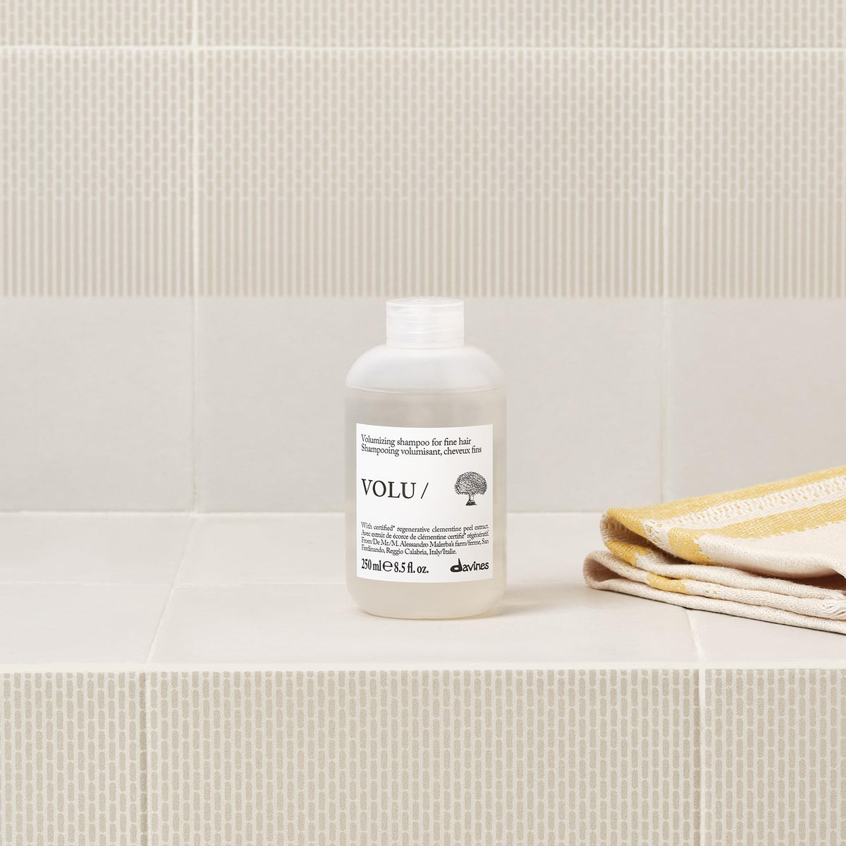 Davines VOLU/ creamy foam close-up showing texture for non-greasy softness