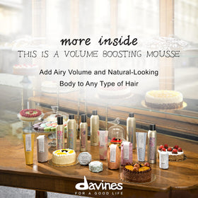 Davines mousse dispensed on palm highlighting snow-like foam and easy spreadability