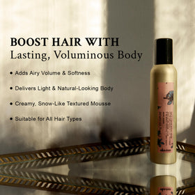 Davines product next to ruler showcasing the 8.45 fl oz size for scale and travel planning