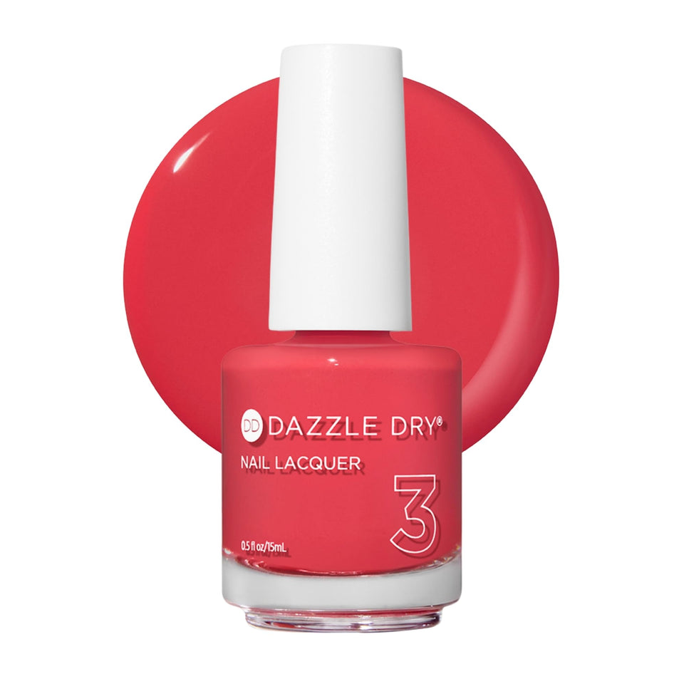 Dazzle Dry bottle front showing vivid coral shade and neat label, vibrant color payoff
