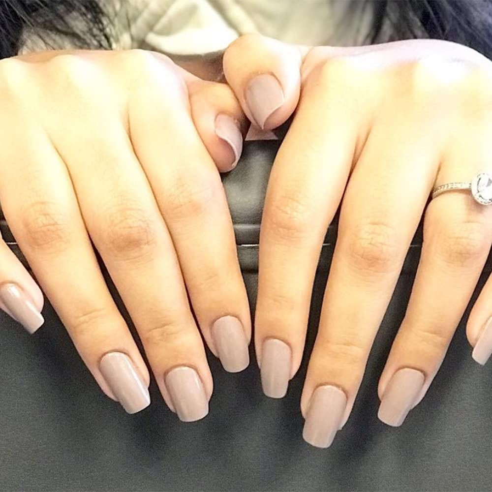 Manicure wearing Broadway Beige with outfit showing versatile, professional look benefit