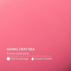 Dazzle Dry painted hand swatch highlighting true coral color benefit