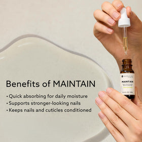 Dazzle Dry oil applied to cuticle demonstrating smoother, hydrated nail edges