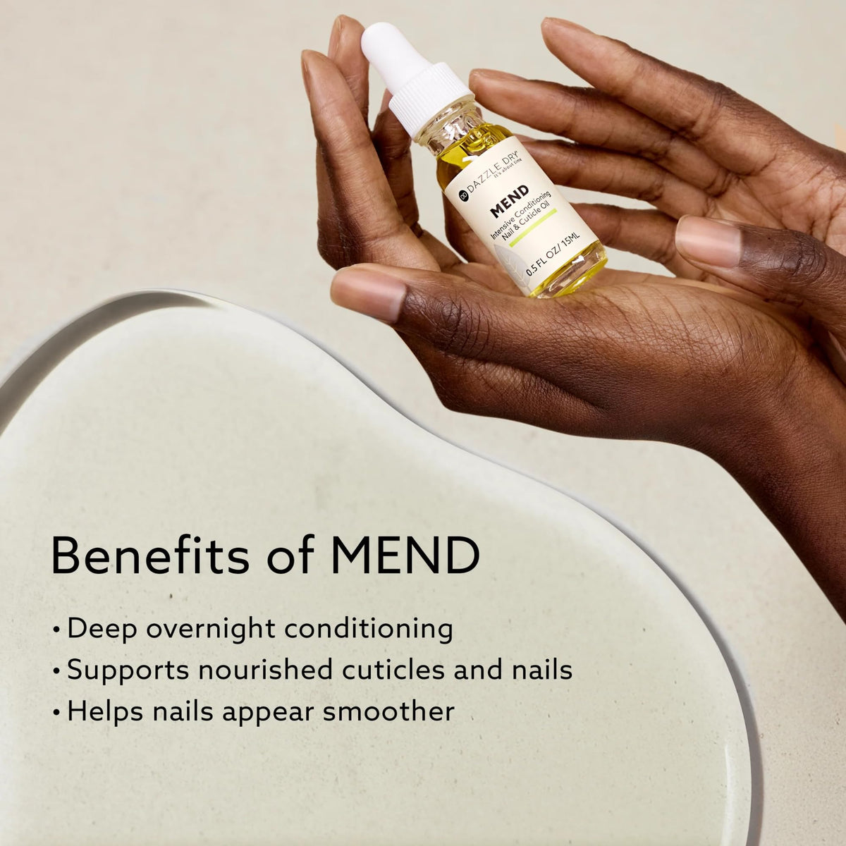 Dazzle Dry bottle in hand demonstrating compact travel-friendly size