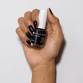 Dazzle Dry lacquer applied on natural nails demonstrating fast dry and salon look
