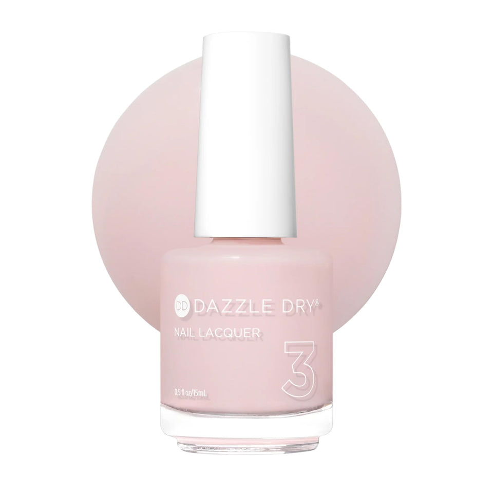 Dazzle Dry front bottle showing pale pink nude shade and quick-dry benefit