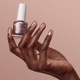 Dazzle Dry nail being painted with Out N' About illustrating quick-dry benefit