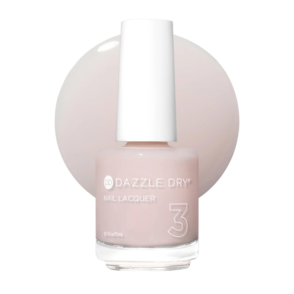 Dazzle Dry Peacefully Me bottle front shows soft pale pink shade and smooth finish