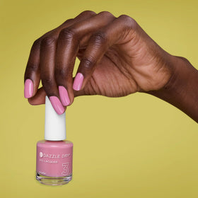 Dazzle Dry lacquer being applied to nail showing precise brush and quick-dry benefit
