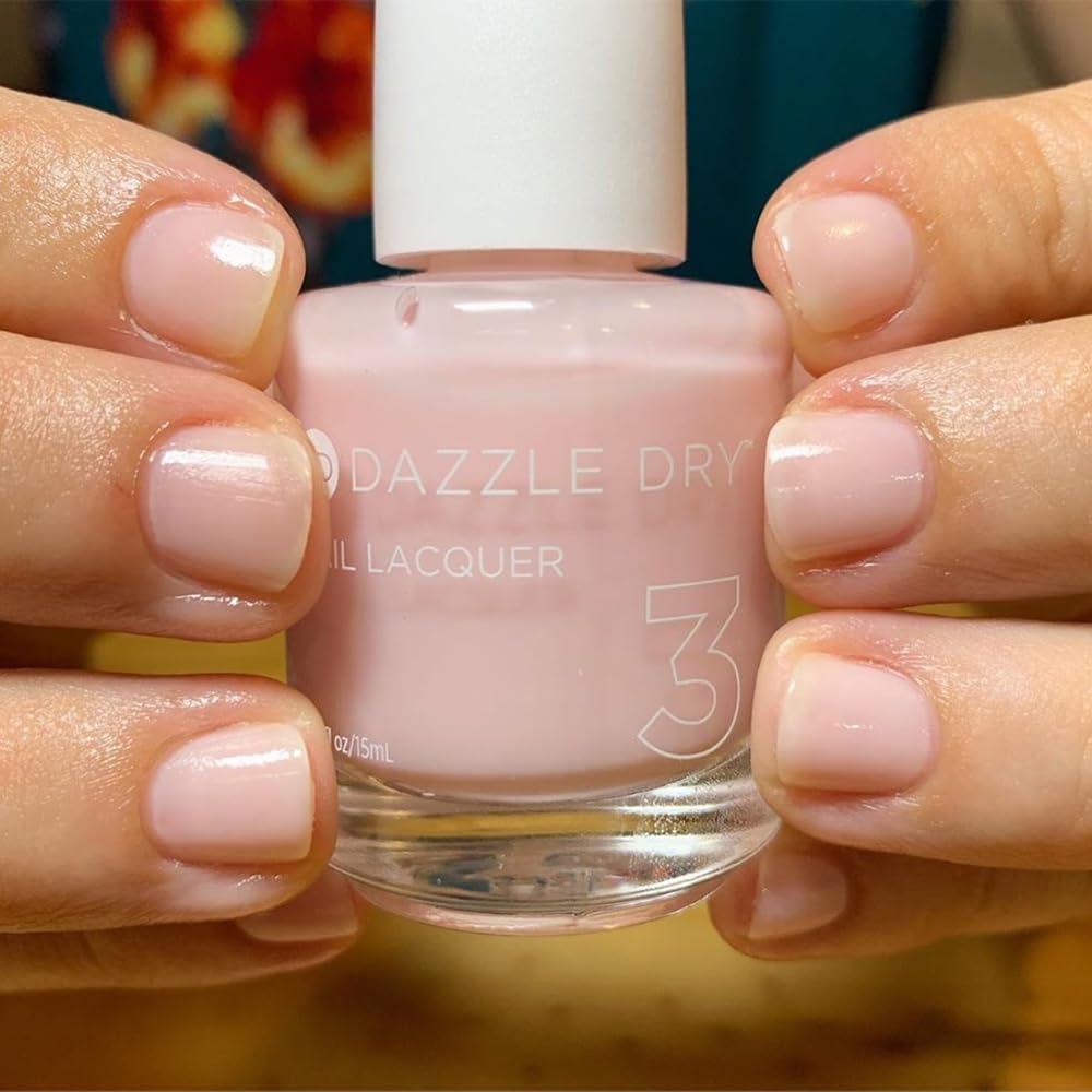Lifestyle image of a fresh manicure using Dazzle Dry Prima Ballerina benefit: classic elegance