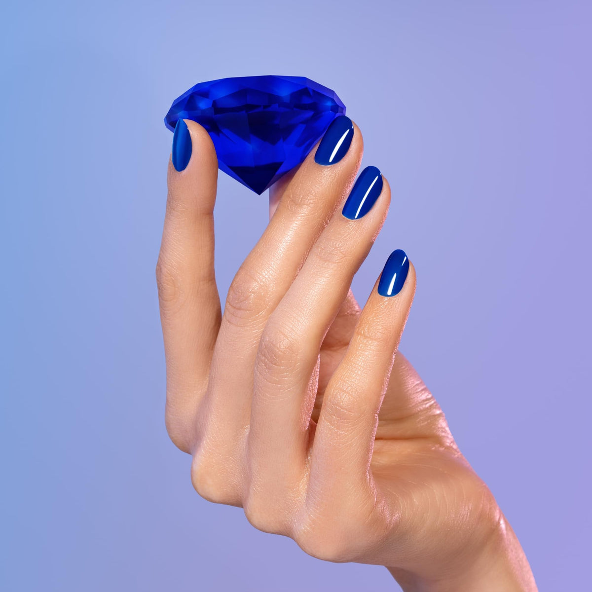 Dazzle Dry Saphira being applied in hand for quick, salon-quality results