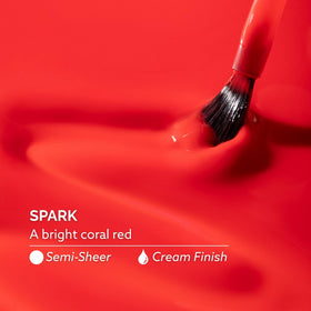 Dazzle Dry swatched on fingernails demonstrating wearable coral color and buildable finish