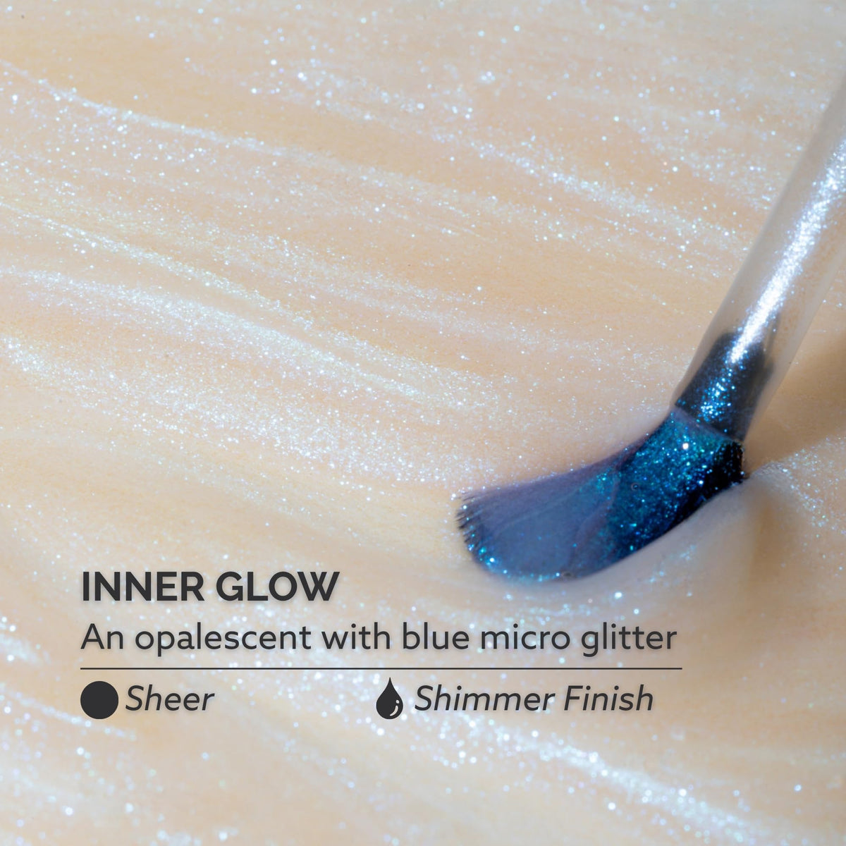 Dazzle Dry swatch on nail wheel showing Inner Glow sheer opalescent sparkle