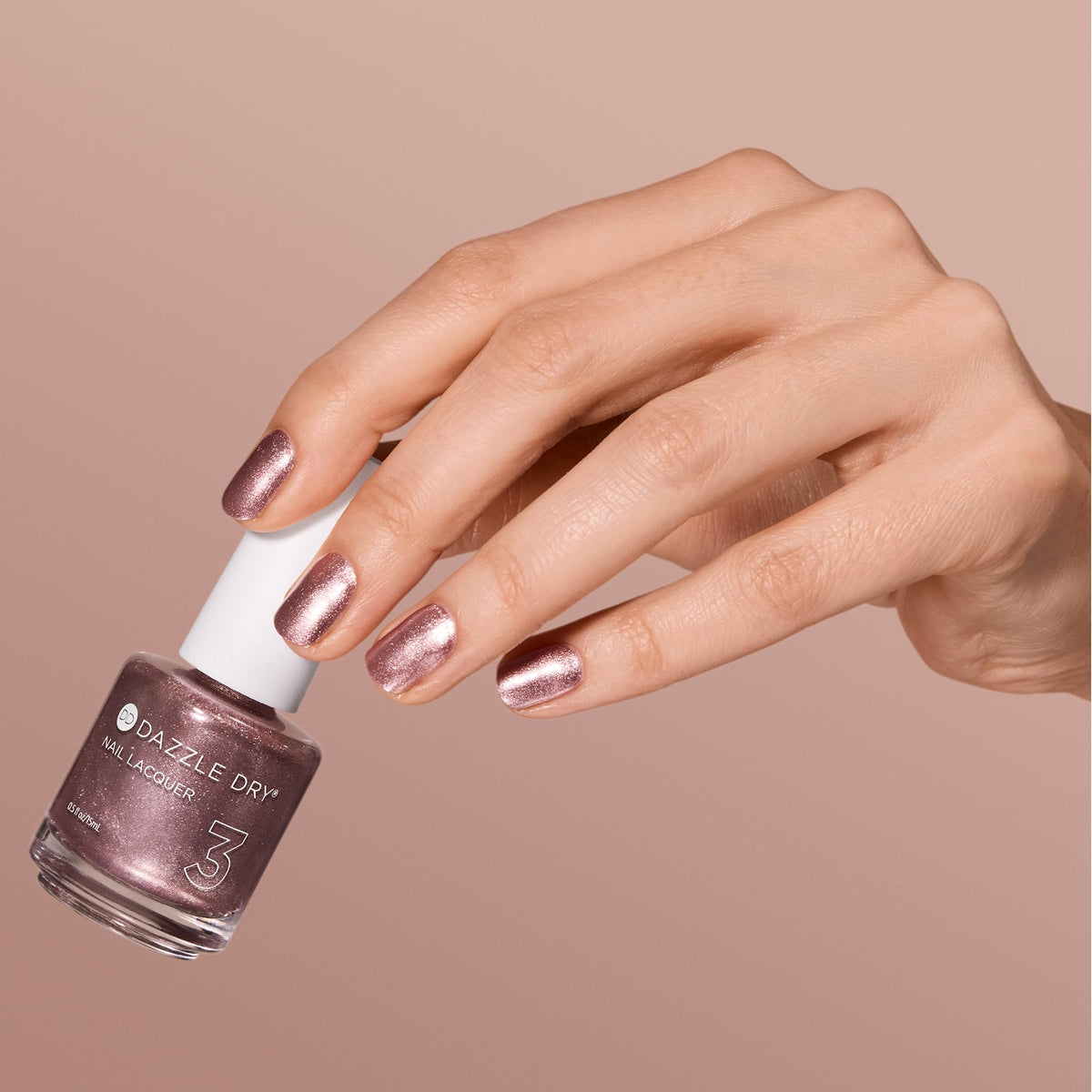 Dazzle Dry swatch of rose gold metallic Out N' About showing true finish