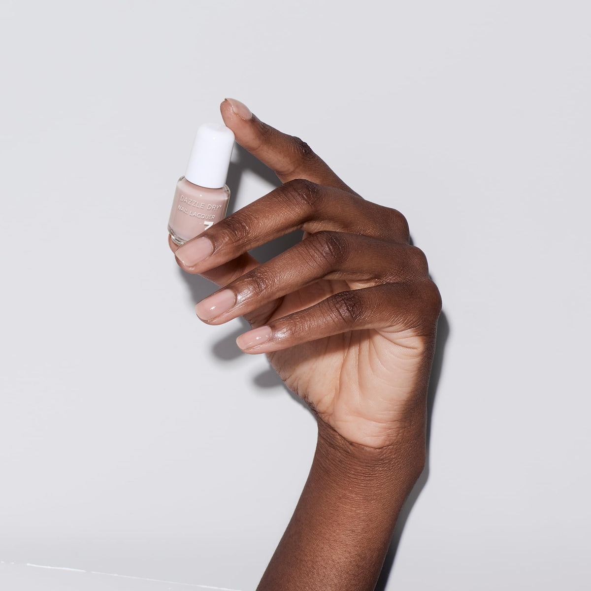 Dazzle Dry top coat droplet texture illustrating fast hard-setting protection