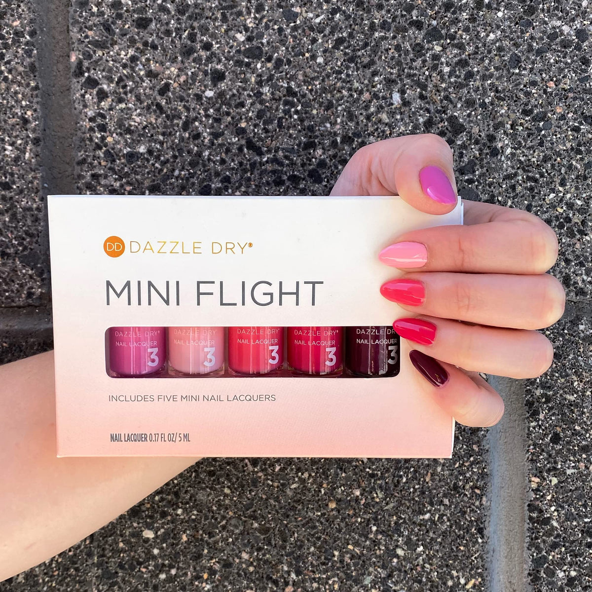 Dazzle Dry Yoga Mama swatch on a nail tip highlighting wearable brightness