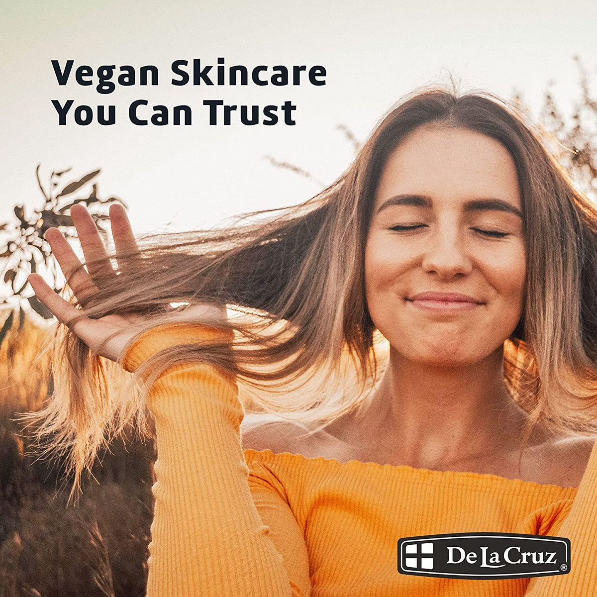 De La Cruz almond oil used on hair ends showing added shine and manageability