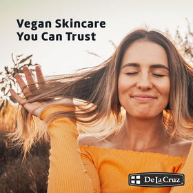 De La Cruz almond oil used on hair ends showing added shine and manageability