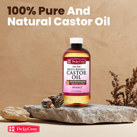 De La Cruz castor oil on spoolie brushing eyebrows for conditioning